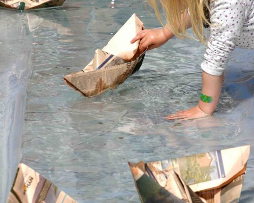 Girl and paperboats Girl and paperboats